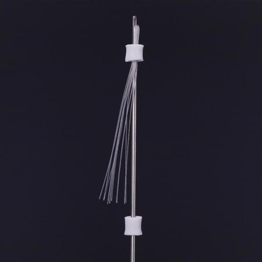 Platinum Threads multi thread — filament bundle fanned on its cannula